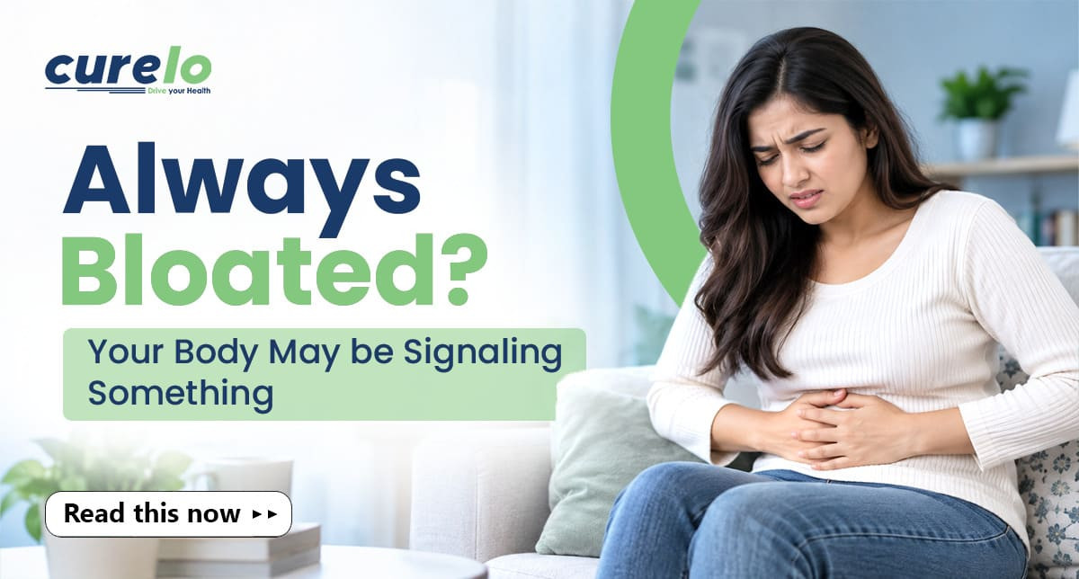 Person holding their bloated stomach experiencing abdominal discomfort