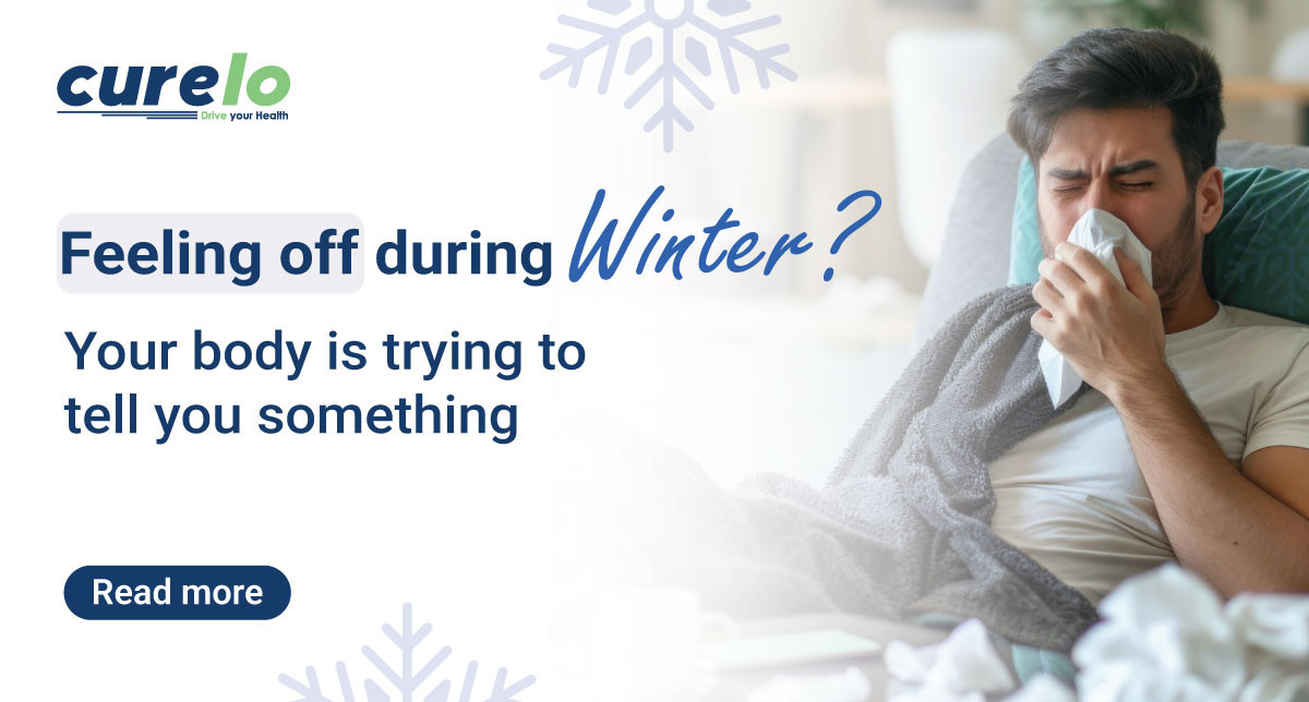 A person feeling tired in winter holding a warm cup of tea, representing seasonal health issues.